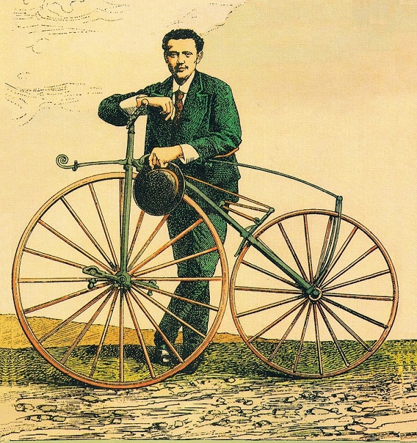 Pierre Michaux junto a uno de los primeros velocípedos con pedales del siglo XIX
